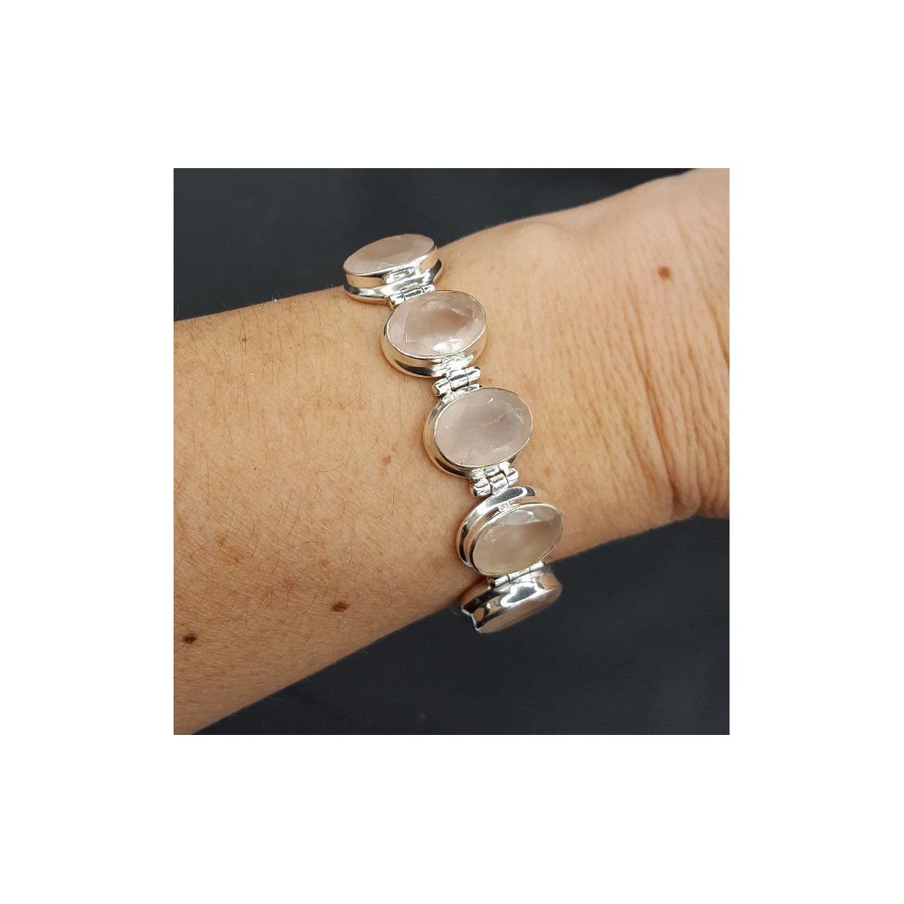 Silver bracelet set with five oval facet rose quartz stones