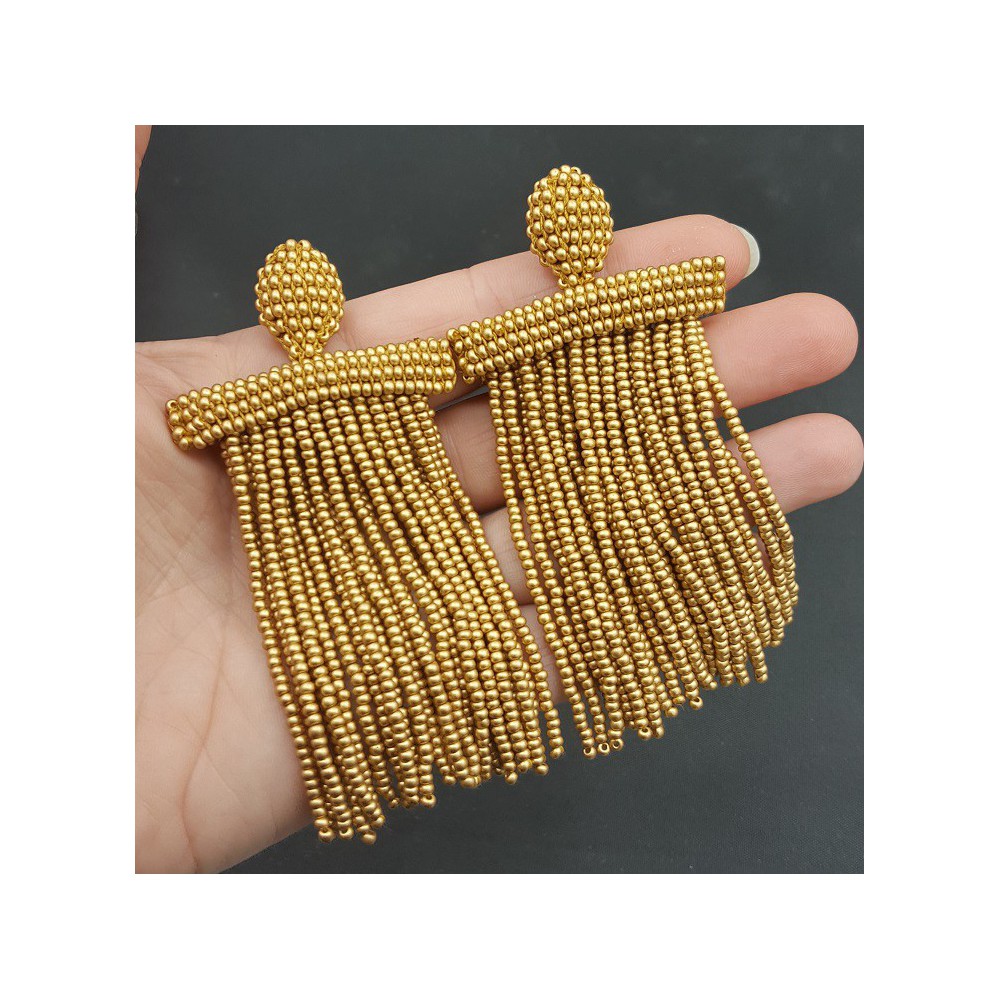 Gold waterfall tassel earrings