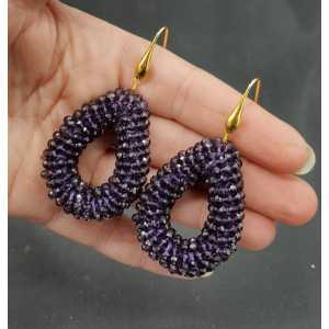 Gold plated earrings with open drop of dark purple crystals