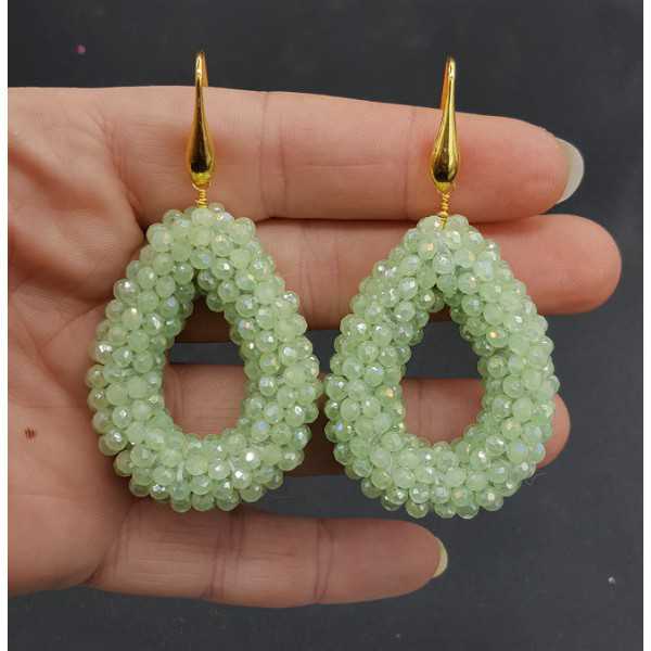 Gold plated earrings open drop with light green crystals