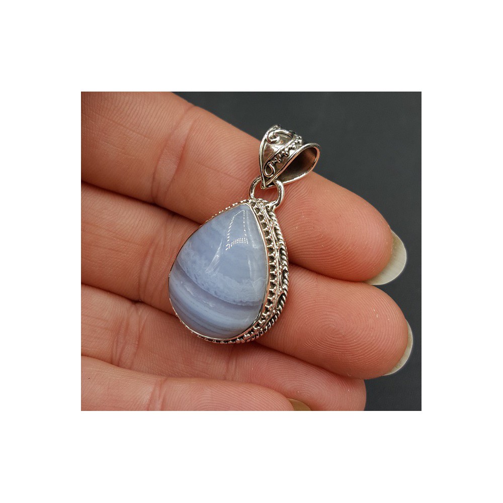 Silver pendant oval shape blue Lace Agate carved setting