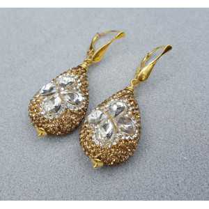 Gold plated earrings with drop, set with white and gold crystals
