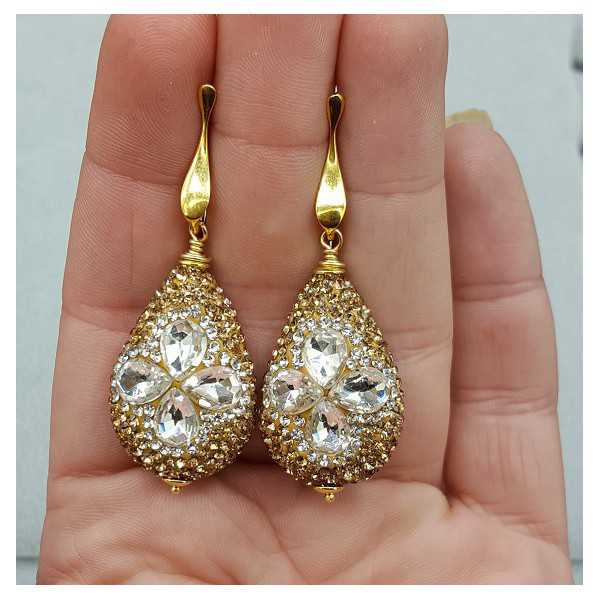 Gold plated earrings with drop, set with white and gold crystals