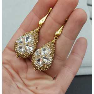 Vergoldete Ohrringe mit Tropfen, mit weißen und gold Kristalle