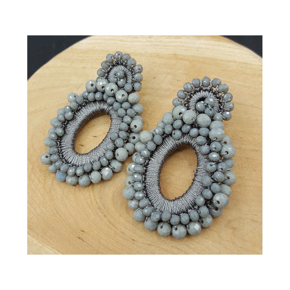 Earrings with pendant on grey silk thread and crystals