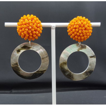 Oorbellen met oranje kristallen en schelp hanger