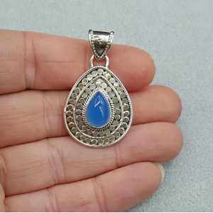Silver pendant set with teardrop shaped blue Chalcedony