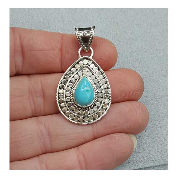 Silver pendant set with teardrop Turquoise