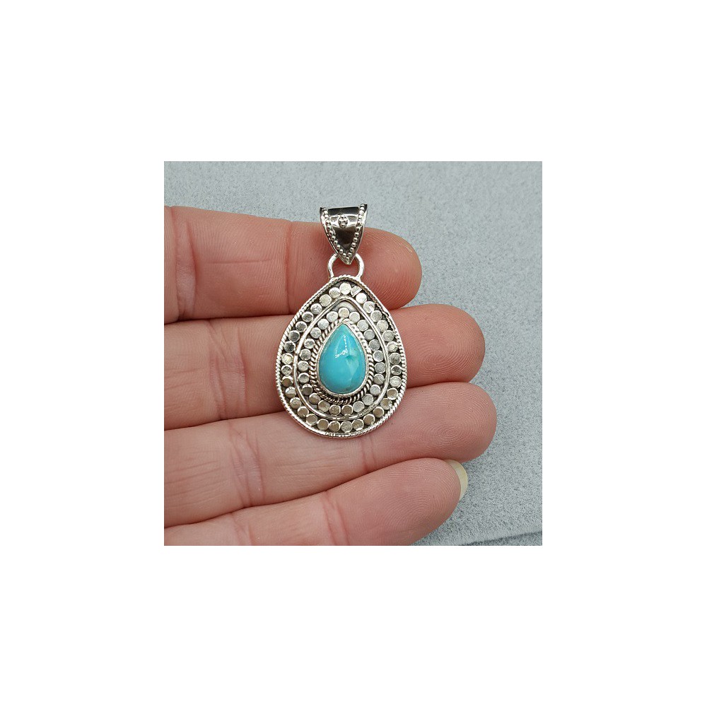 Silver pendant set with teardrop Turquoise