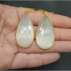 Gold plated earrings with large narrow white cat's eye