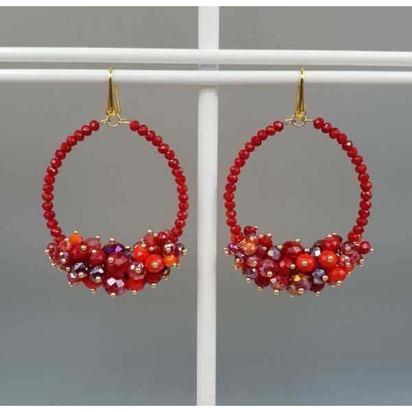 Gold plated earrings with red crystals
