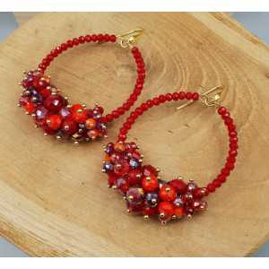 Gold plated earrings with red crystals