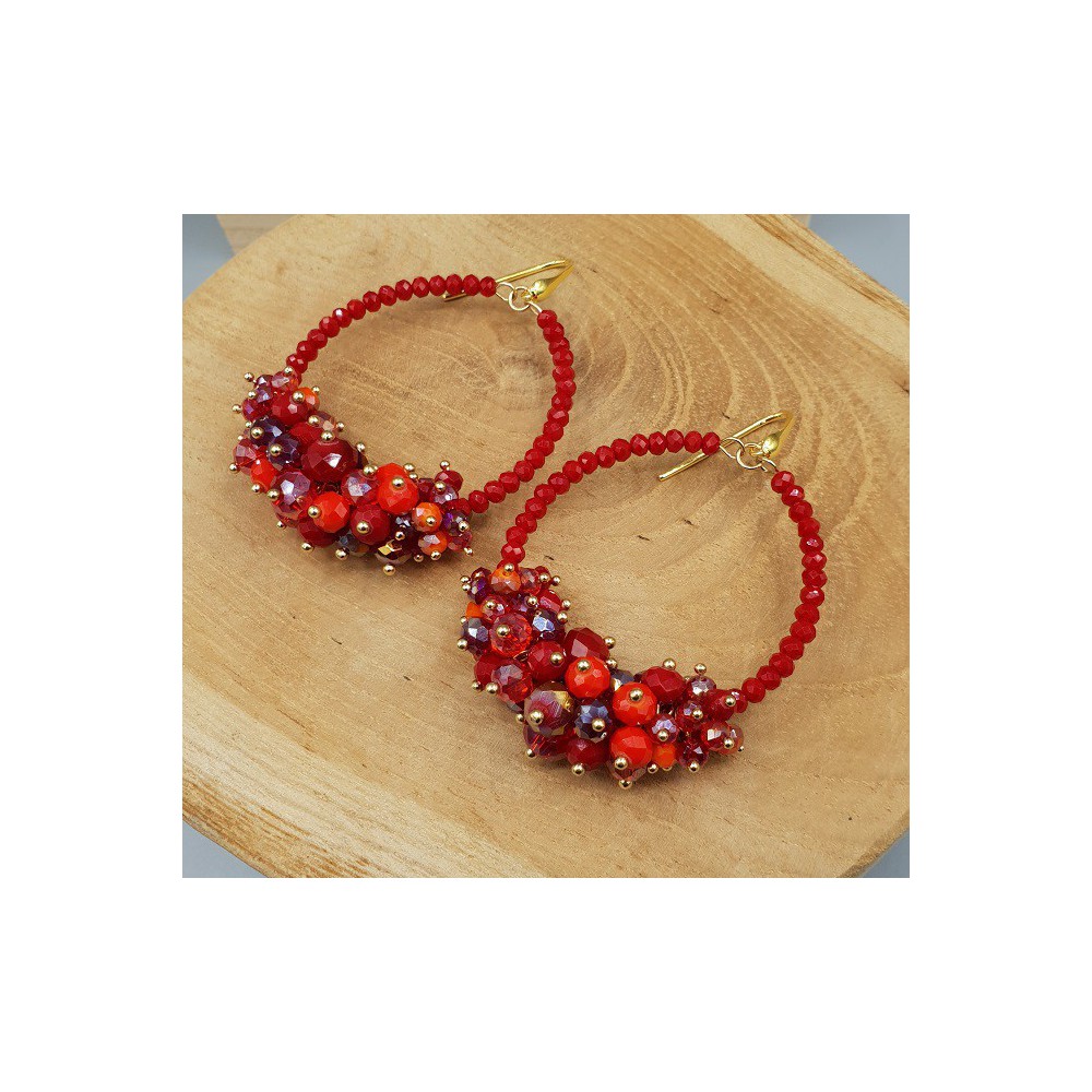 Gold plated earrings with red crystals