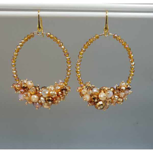Gold plated earrings with crystals