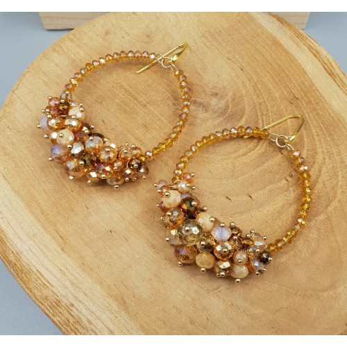 Goud vergulde oorbellen met kristallen