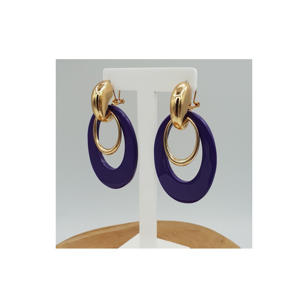 Gouden creolen met paarse Buffelhoorn hanger