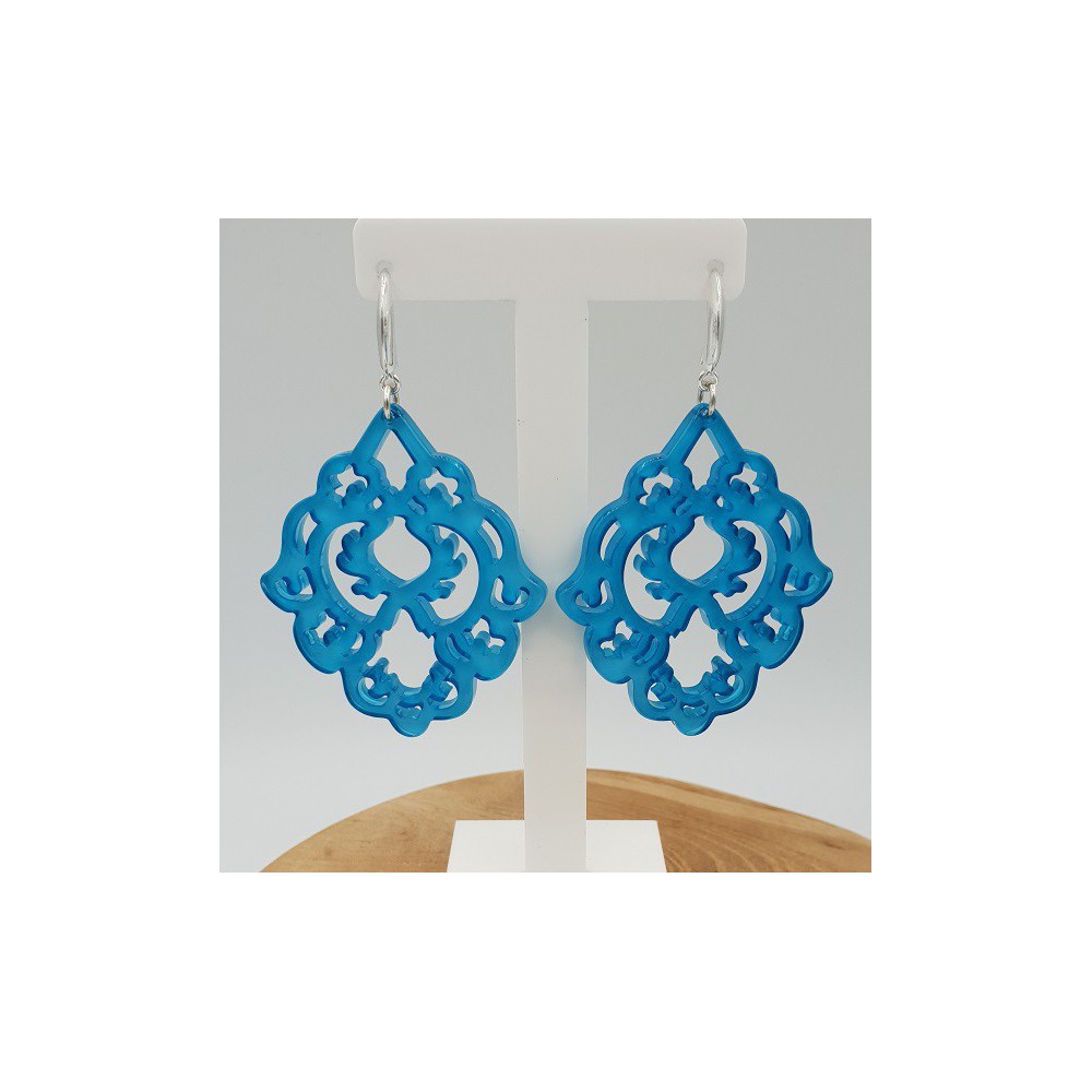 Earrings with blue resin pendant