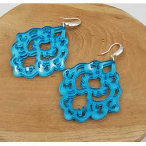 Earrings with blue resin pendant