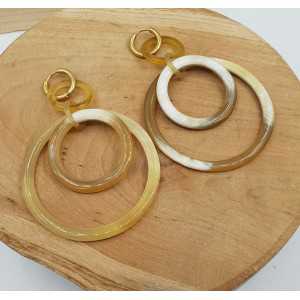 Creoles with rings of buffalo horn