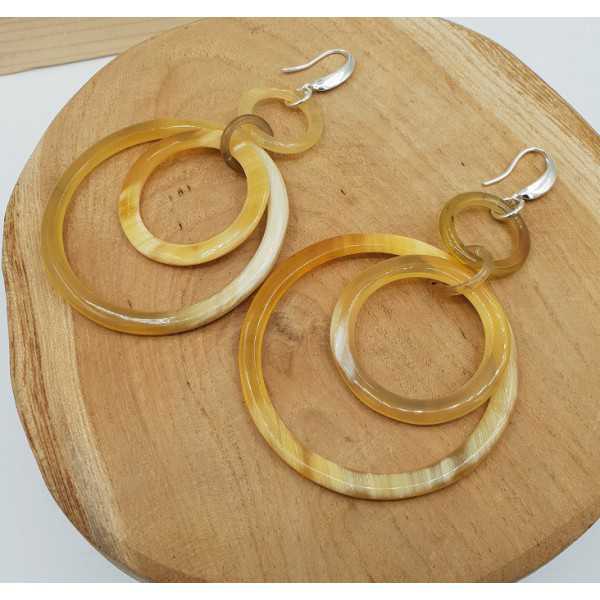Earrings with rings of buffalo horn