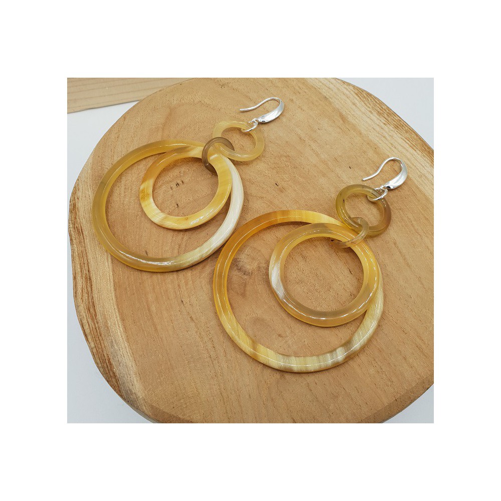 Earrings with rings of buffalo horn