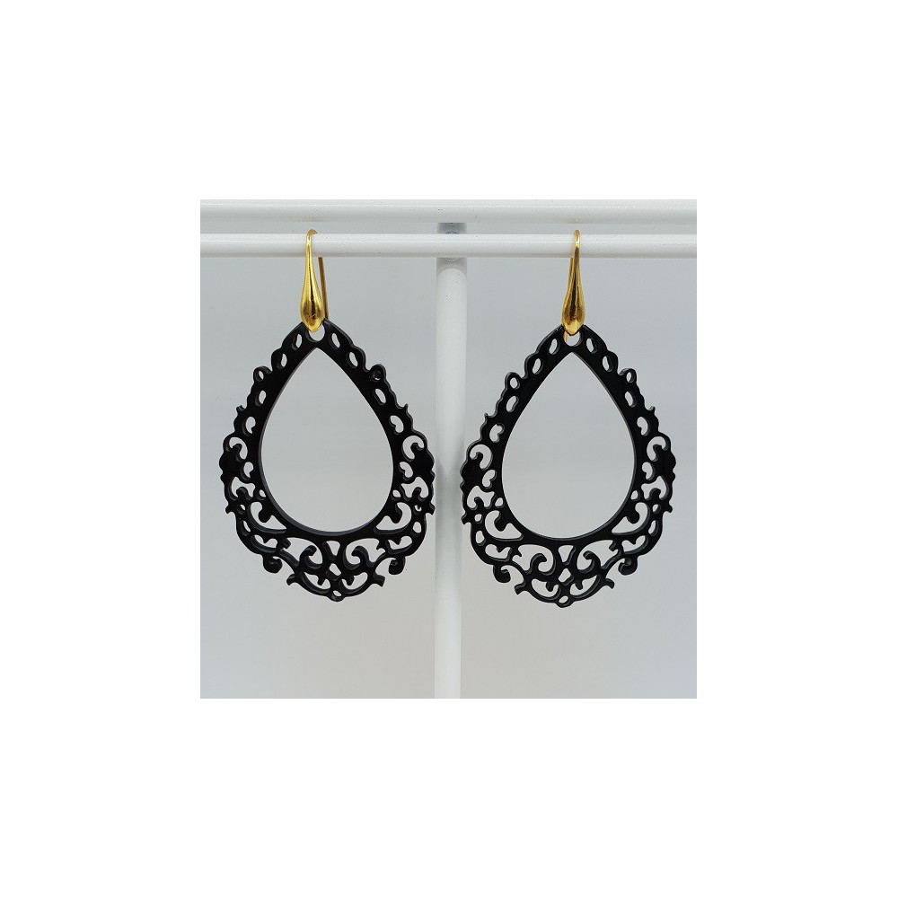 Earrings with an open worked drop of black buffalo horn