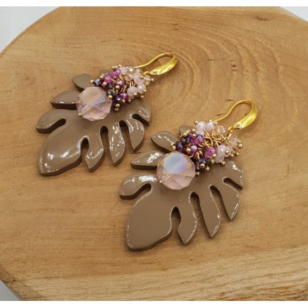 Goud vergulde oorbellen met kristallen en blad van Buffelhoorn