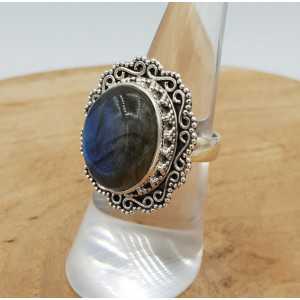Silver ring set with Labradorite and carved head 16.5 mm