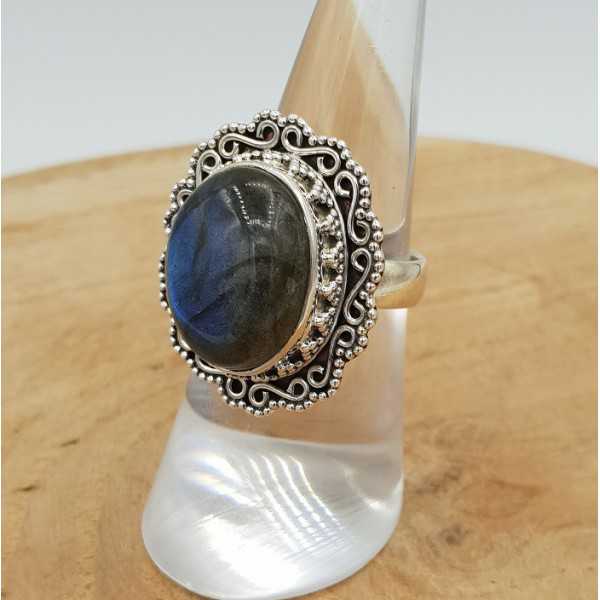 Silver ring set with Labradorite and carved head 16.5 mm