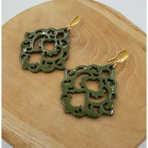 Earrings with green lacquered buffalo horn