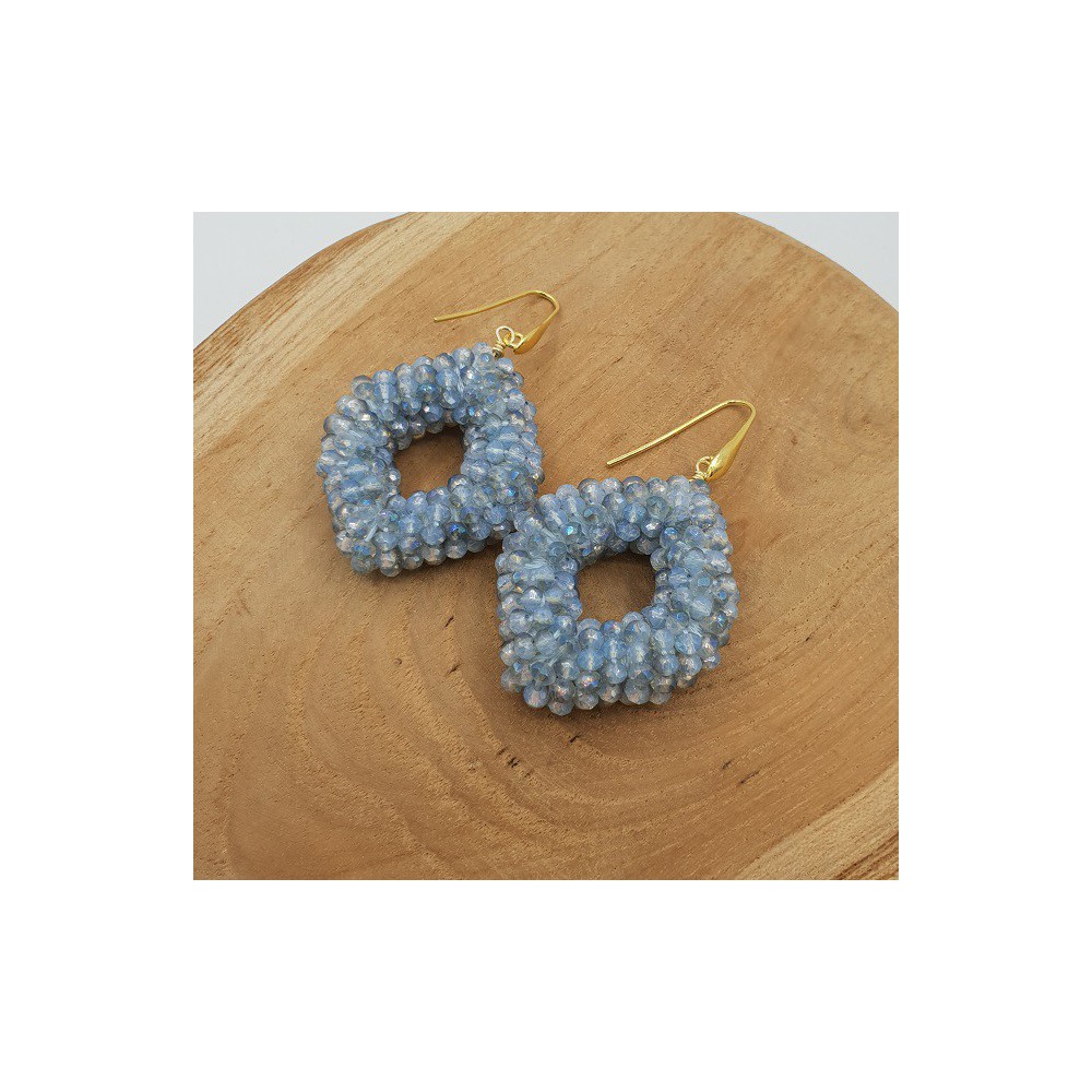 Gold plated blackberry earrings with light blue crystals