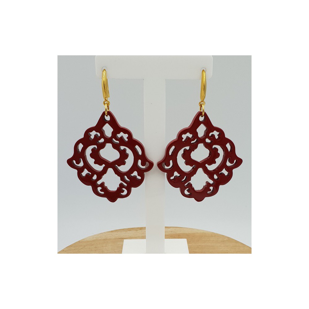 Earrings with red lacquered buffalo horn