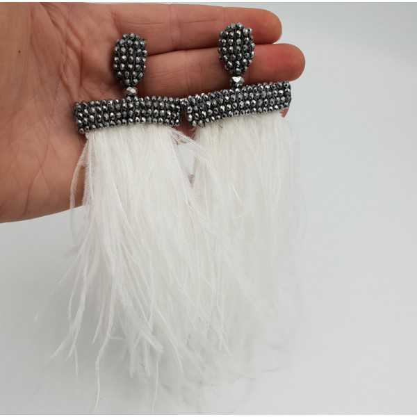 Tassel earrings with white feathers and silver crystals