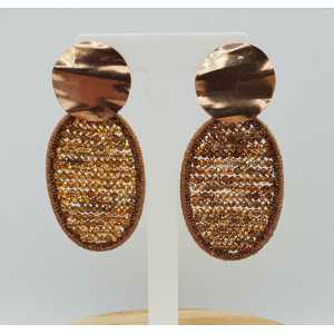 Rosé goud vergulde oorbellen met ovale hanger van zijdedraad en kristallen