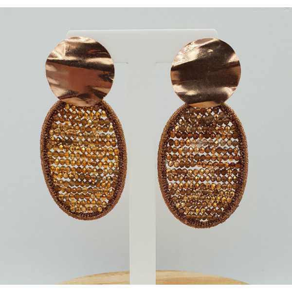 Rose gold plated earrings with oval pendant made of silk thread and crystals