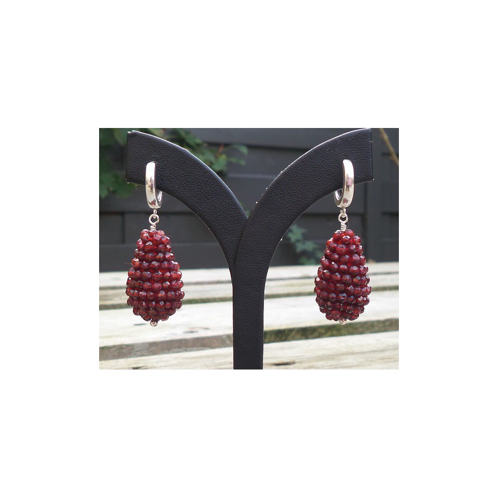 Silver earrings with drop of faceted Garnets