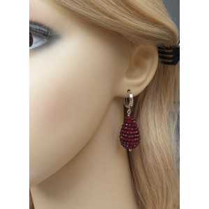 Silver earrings with drop of faceted Garnets
