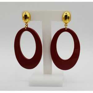 Earrings with oval red buffalo horn pendant