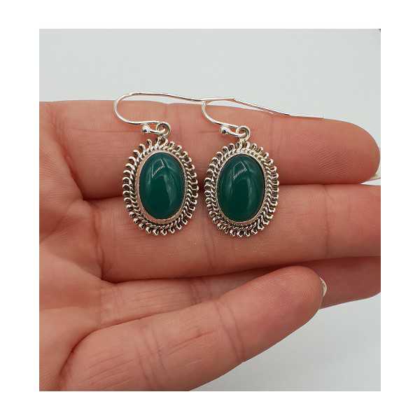 Silver earrings with oval cabochon cut green Onyx