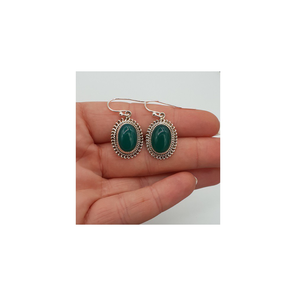 Silver earrings with oval cabochon cut green Onyx