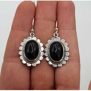 Silver earrings with large oval Goudsteen