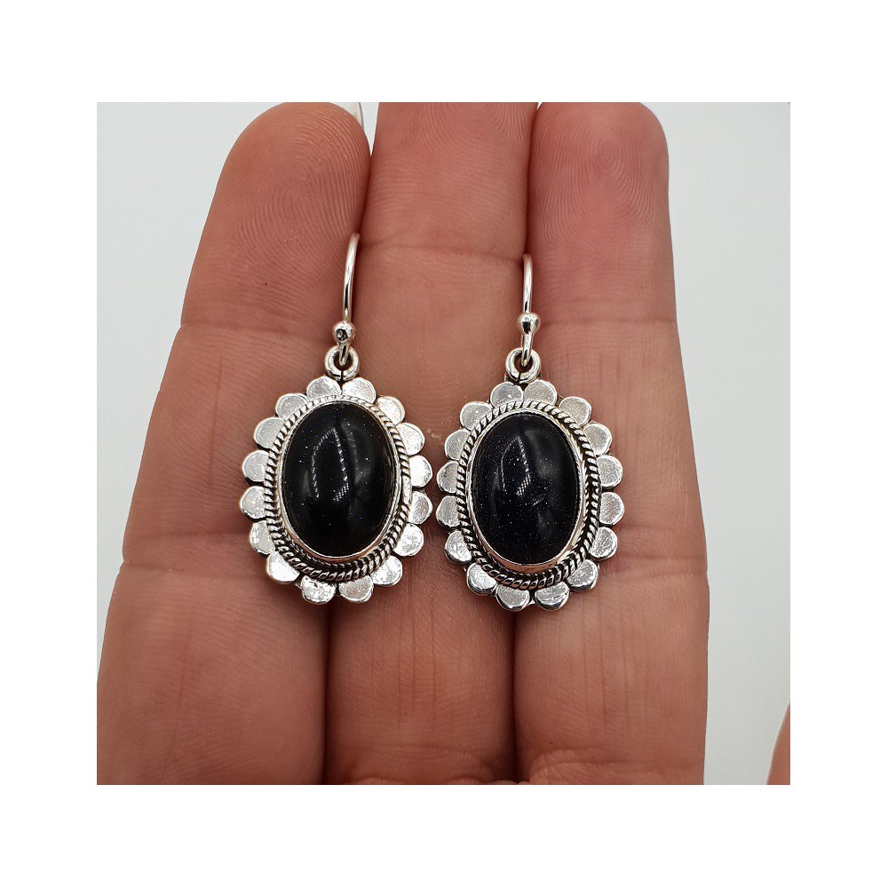 Silver earrings with large oval Goudsteen