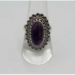 Silver ring with oval cabochon Amethyst and carved head 18 mm