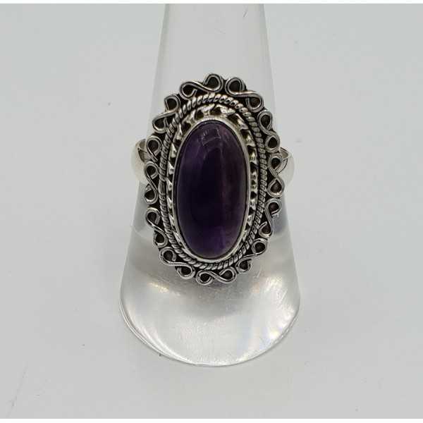 Silver ring with oval cabochon Amethyst and carved head 18 mm