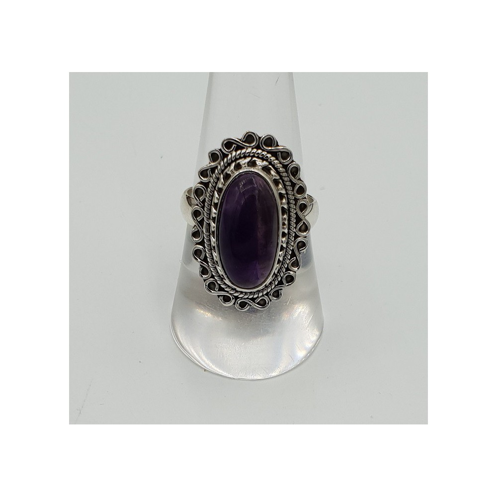 Silver ring with oval cabochon Amethyst and carved head 18 mm