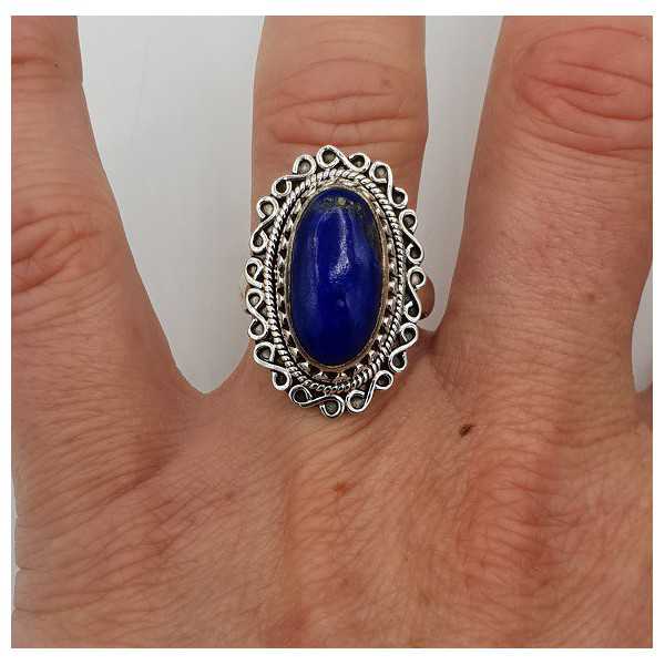 Silver ring with oval Lapis Lazuli and carved head 17.3 mm