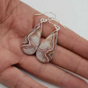 Silver earrings set with Laguna Lace Agate