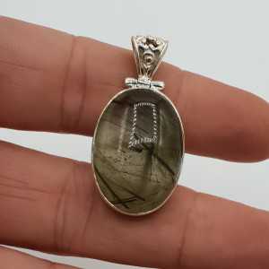 Silver pendant set with green Rutielkwarts