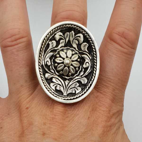Silver ring with large oval machined head adjustable