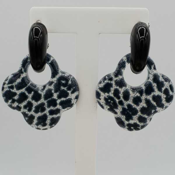 Black creoles with clover resin pendant with tiger print